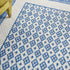 Ivory and Blue Geometric Area Rug